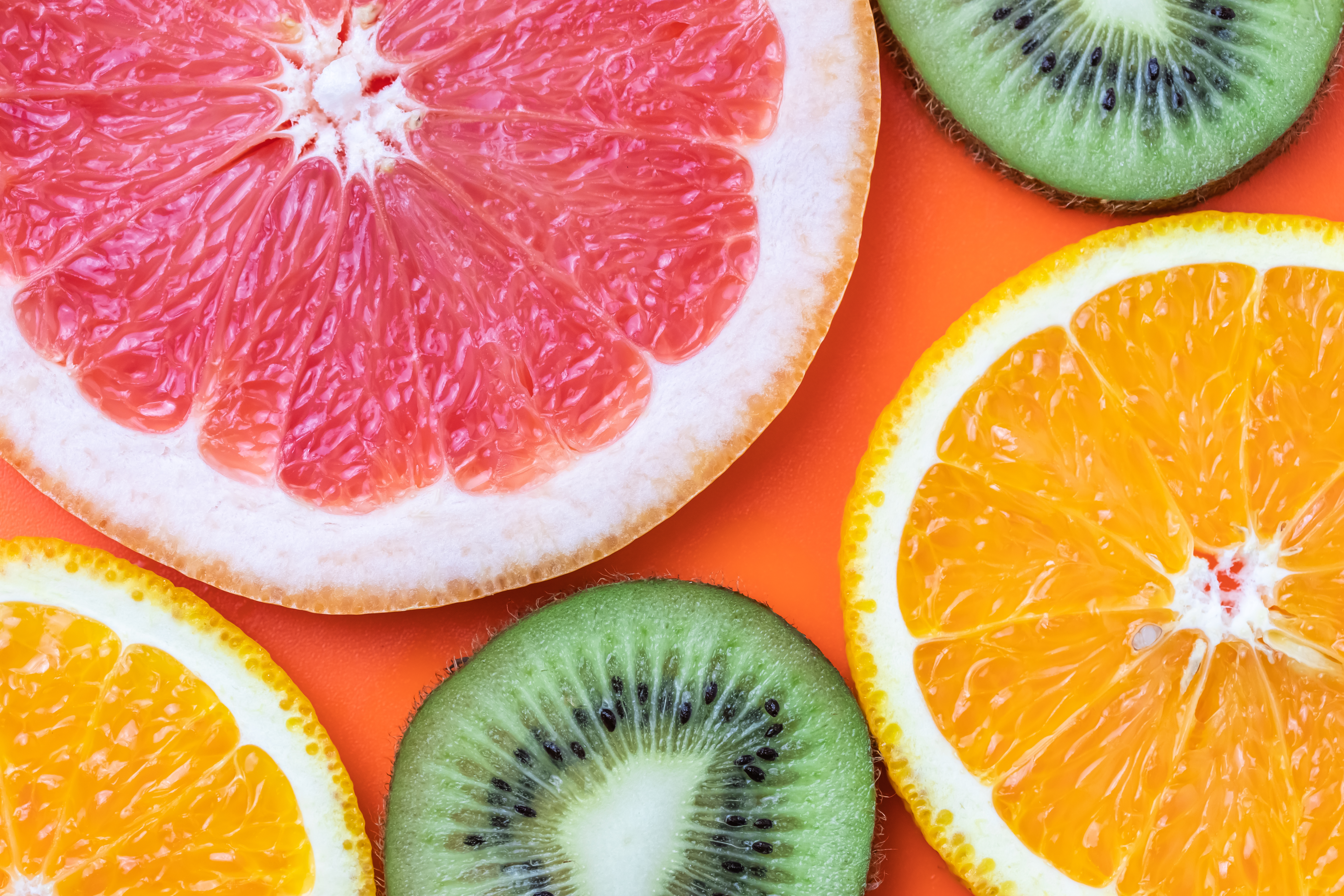 colorful-pattern-of-citrus-fruits-slices-on-orange-2022-05-26-22-02-12-utc.jpg